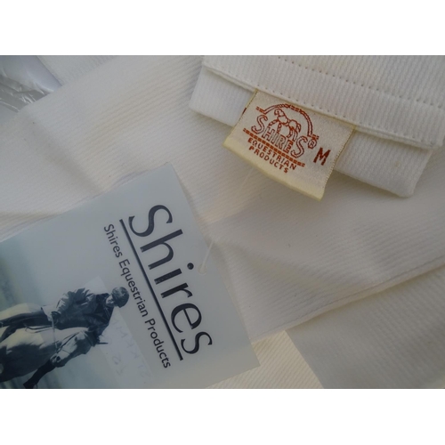 368 - Assorted horse riding items, to include two Dublin ladies show shirts, size EU 42 and EU 40, with ta... 