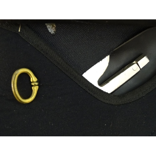 373 - A black narrow synthetic horse riding / equestrian saddle. Approx. 17