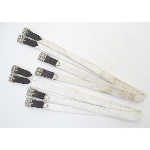 381 - A quantity of racing girths, 40