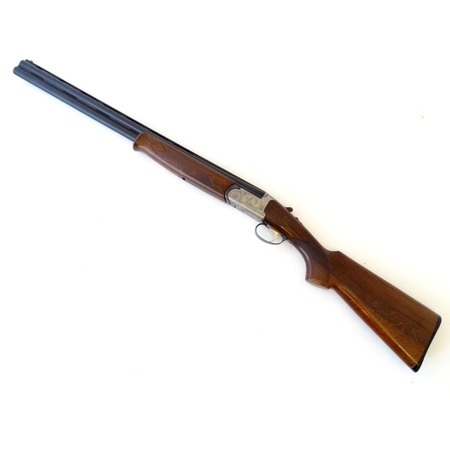 583 - Shotgun: a Bettinsoli 12 gauge over and under ejector shotgun, single selective trigger, walnut pist... 