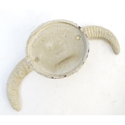 293 - Five cast wall hanging coat hooks formed as stylised rams horns with painted decoration. Approx. 7 3... 