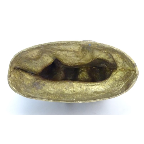 305 - A Continental cast sculpture depicting a fox and two fox cubs with traces of gilt finish. Approx. 4 ... 