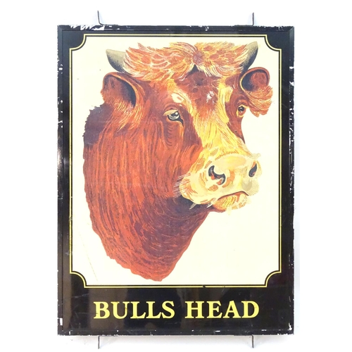 1034 - A 20thC pub sign, 'Bull's Head', with printed lettering and illustration of an Ayrshire bull, 44 1/2... 