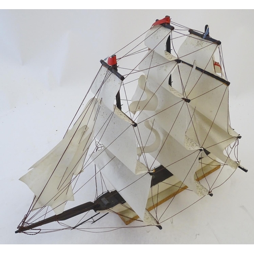 1040 - An early 20thC scratch built naive model of three mast ship / boat with flags to include Bavaria and... 