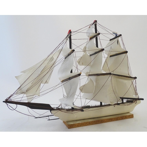 1040 - An early 20thC scratch built naive model of three mast ship / boat with flags to include Bavaria and... 