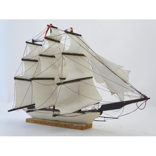 1040 - An early 20thC scratch built naive model of three mast ship / boat with flags to include Bavaria and... 