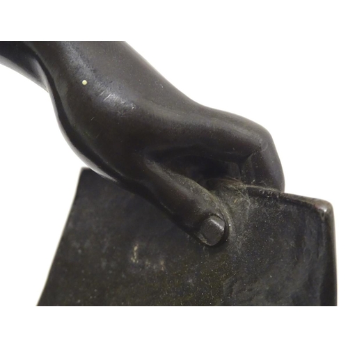 1041 - A French 19thC bronze figure of a blacksmith forging a shield, signed A. Masjouille. Plaque to base ... 