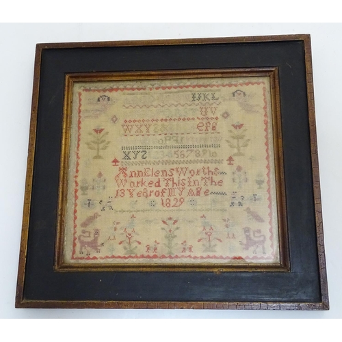 1027 - A Victorian needlework sampler decorated with the alphabet letter, numbers, numbers and the text Ann... 