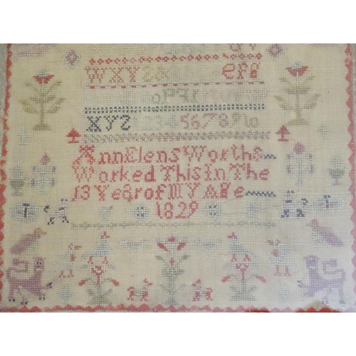 1027 - A Victorian needlework sampler decorated with the alphabet letter, numbers, numbers and the text Ann... 