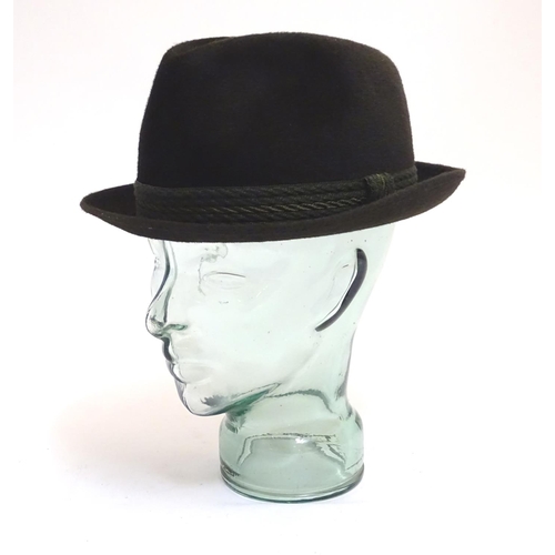 1036 - A Dunn & Co green felt trilby hat, with leather inner band, size 7 1/2 (58), in a James R. Ogden & S... 