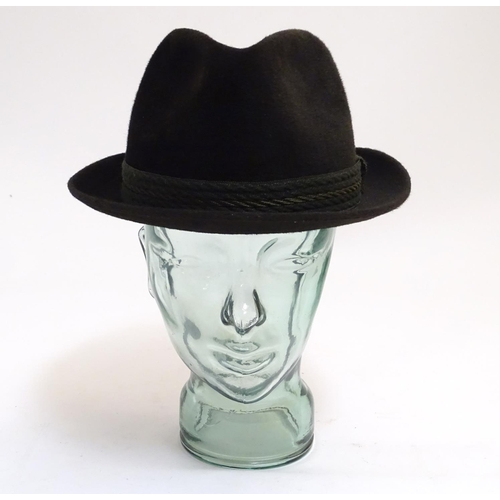 1036 - A Dunn & Co green felt trilby hat, with leather inner band, size 7 1/2 (58), in a James R. Ogden & S... 