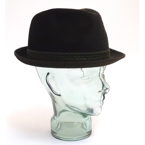 1036 - A Dunn & Co green felt trilby hat, with leather inner band, size 7 1/2 (58), in a James R. Ogden & S... 