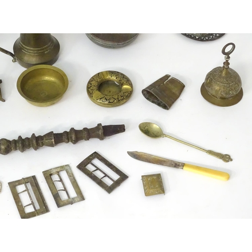 1039 - An assortment of Eastern metalware, including teapots, dishes, pendant lamp shades, various shisha p... 