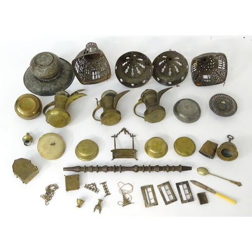 1039 - An assortment of Eastern metalware, including teapots, dishes, pendant lamp shades, various shisha p... 