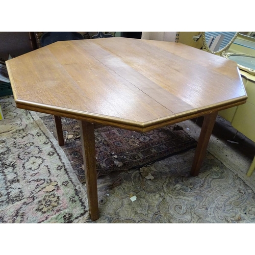 187 - An oak octagonal dining table. Approx. 46
