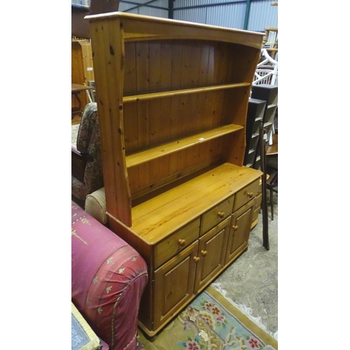 191 - A late 20thC pine dresser. Approx. 69 1/4