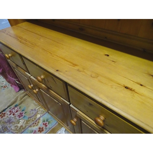 191 - A late 20thC pine dresser. Approx. 69 1/4