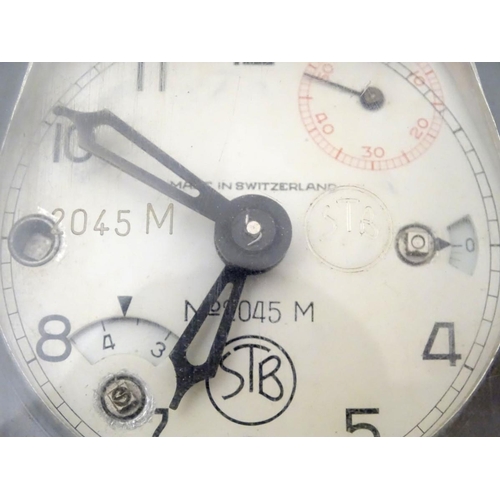 193 - Pigeon Racing : a STB Master Timer Pigeon Racing Clock with aluminium case and leather carry strap.