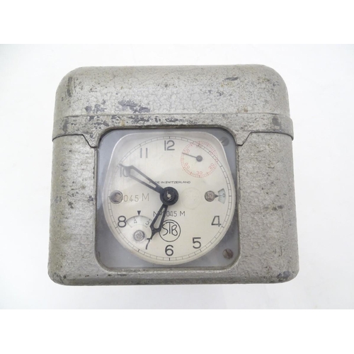193 - Pigeon Racing : a STB Master Timer Pigeon Racing Clock with aluminium case and leather carry strap.