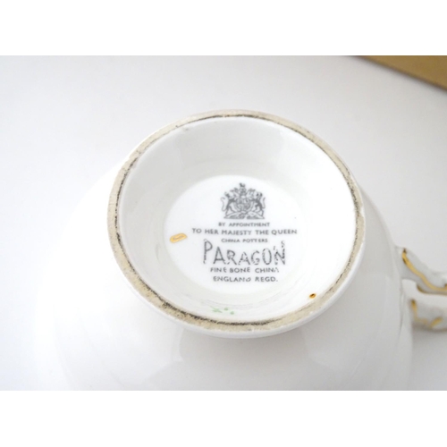 198 - A quantity of tea and dinner wares by Paragon china