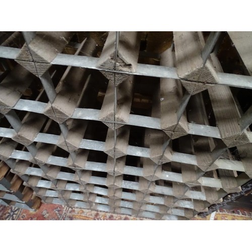 202 - Two wine racks. The largest approx. 31 1/4