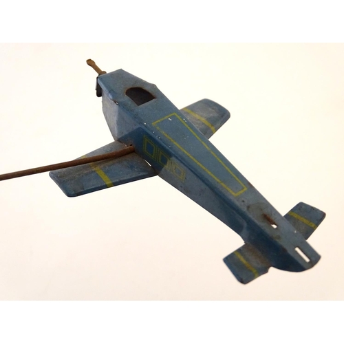 205 - Toys: An early 20thC tin plate Tower Aeroplane / airplane by Louis Marx & Co. Approx. 8 1/2