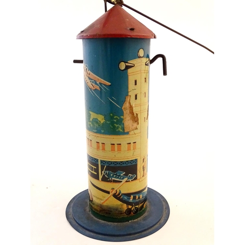 205 - Toys: An early 20thC tin plate Tower Aeroplane / airplane by Louis Marx & Co. Approx. 8 1/2