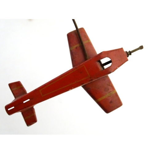 205 - Toys: An early 20thC tin plate Tower Aeroplane / airplane by Louis Marx & Co. Approx. 8 1/2