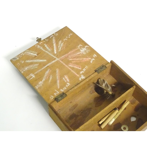 210 - A box of vintage darts some with feather flights contained within a wooden box. Approx. 7 pieces.