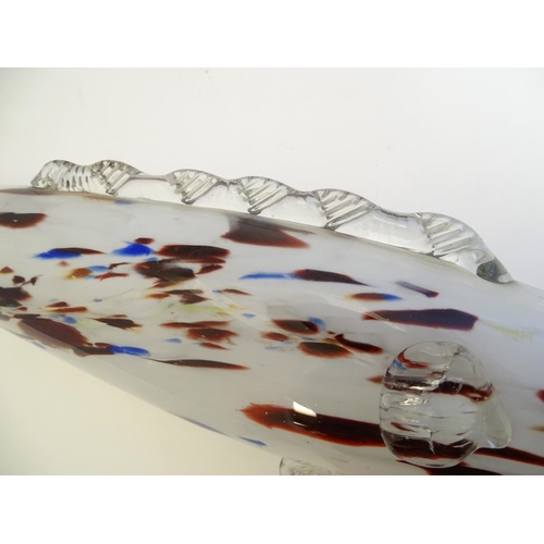 192 - A Murano glass model of a fish, decorated in white with red and blue flecks. 18 1/4