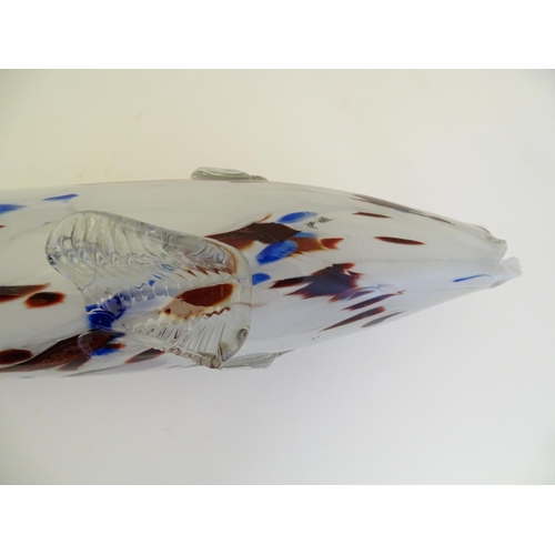 192 - A Murano glass model of a fish, decorated in white with red and blue flecks. 18 1/4