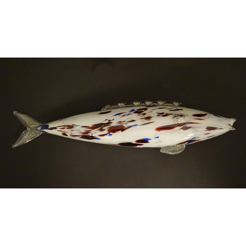 192 - A Murano glass model of a fish, decorated in white with red and blue flecks. 18 1/4