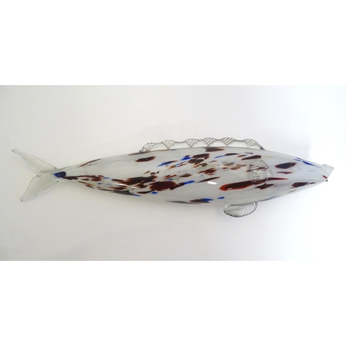 192 - A Murano glass model of a fish, decorated in white with red and blue flecks. 18 1/4