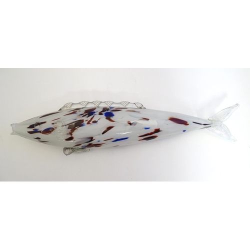 192 - A Murano glass model of a fish, decorated in white with red and blue flecks. 18 1/4
