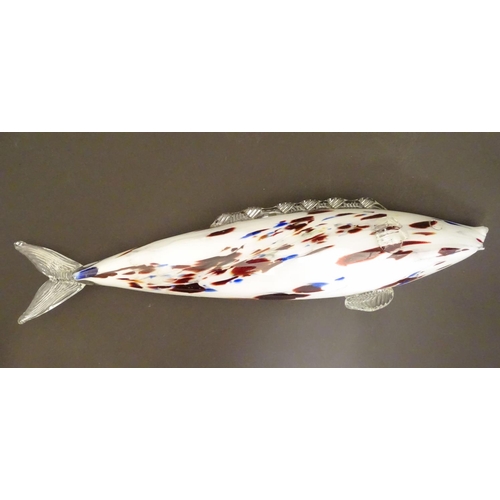 192 - A Murano glass model of a fish, decorated in white with red and blue flecks. 18 1/4