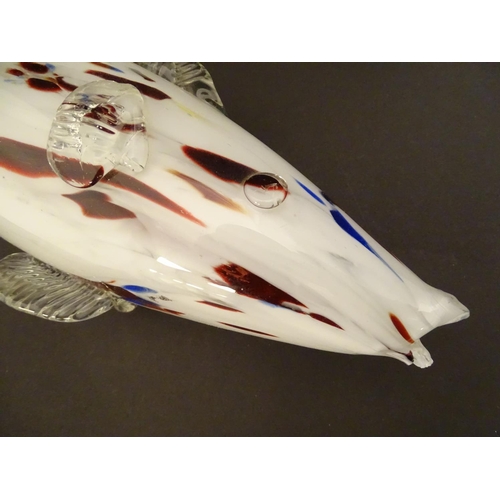 192 - A Murano glass model of a fish, decorated in white with red and blue flecks. 18 1/4