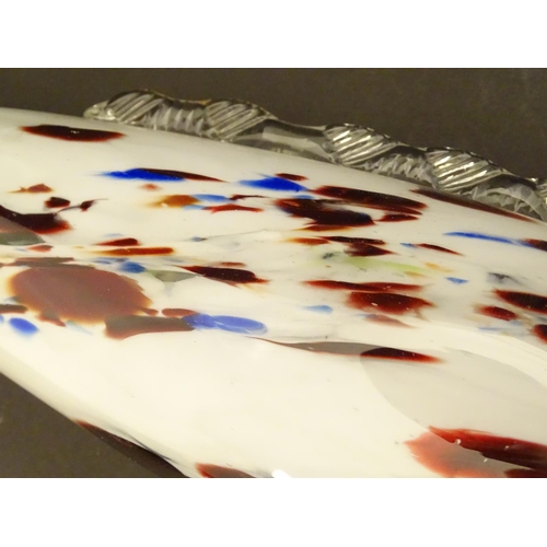 192 - A Murano glass model of a fish, decorated in white with red and blue flecks. 18 1/4