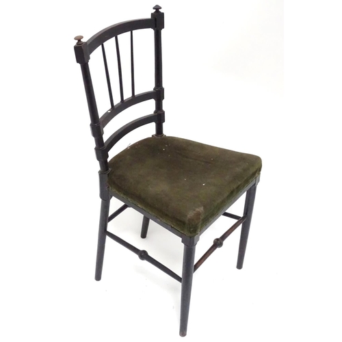 22 - An early 20thC small ebonised bedroom chair with a velvet upholstered seat. Approx. 32 1/2