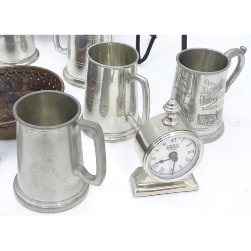 184 - A quantity of metalware to include tankards, cooper and iron items etc.