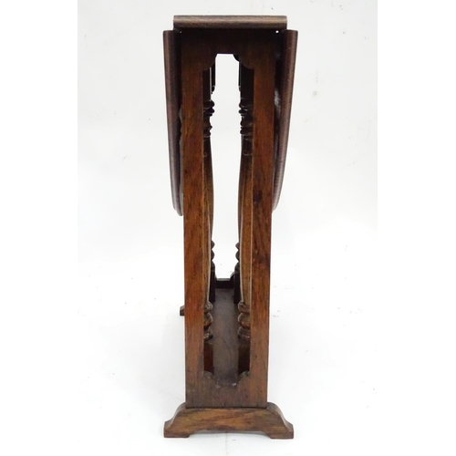 188 - A small oak Sutherland gateleg table. Approx. 19