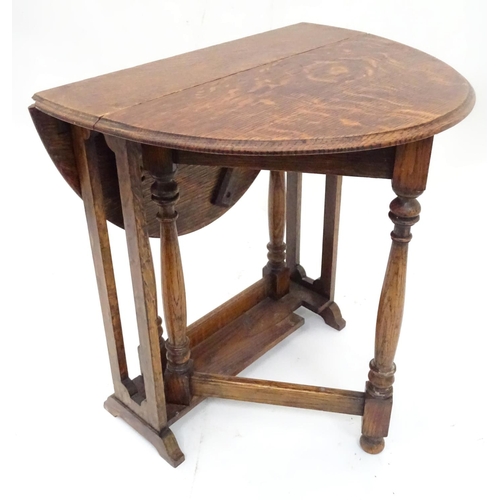 188 - A small oak Sutherland gateleg table. Approx. 19
