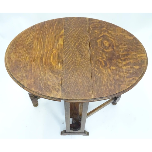 188 - A small oak Sutherland gateleg table. Approx. 19