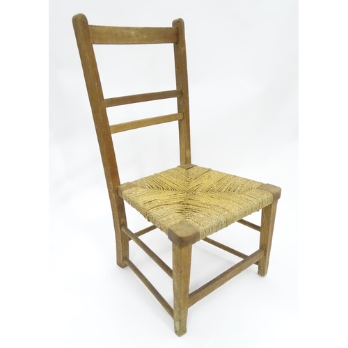 204 - A Victorian fire screen with decoupage horse / equestrian decoration, together with a low chair. The... 