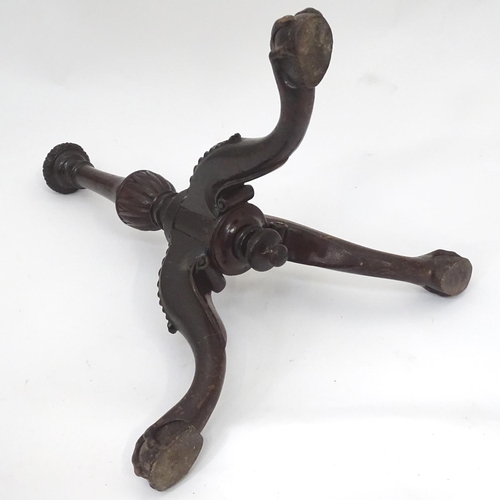 207 - A 19thC mahogany carved wine table base with ball and claw feet. Approx. 22
