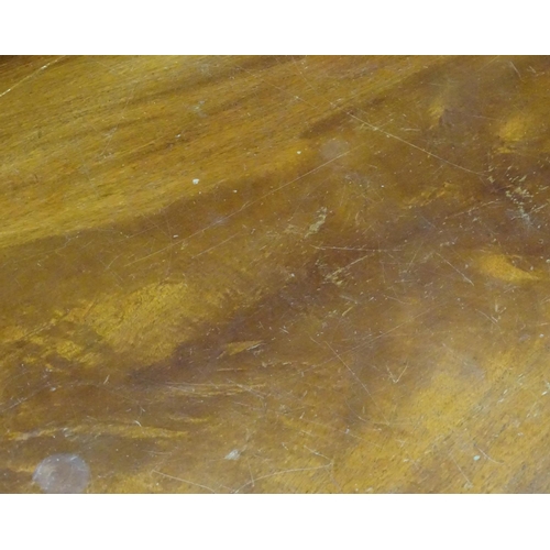 212 - A 20thC mahogany oval occasional table. Approx. 48