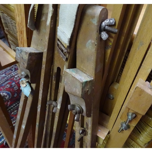 217 - Five late 20thC artist's easels. The largest approx. 20