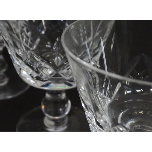 218 - A quantity of crystal wine glasses, a decanter etc.