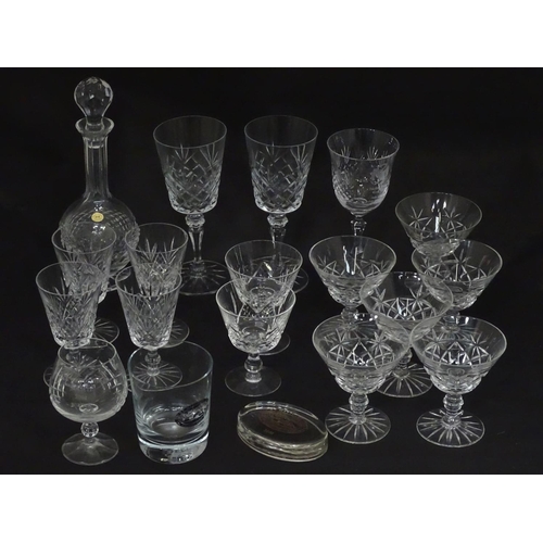 218 - A quantity of crystal wine glasses, a decanter etc.