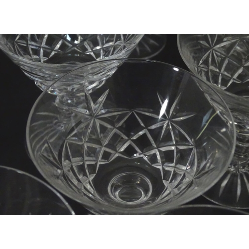 218 - A quantity of crystal wine glasses, a decanter etc.