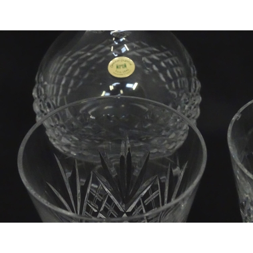 218 - A quantity of crystal wine glasses, a decanter etc.